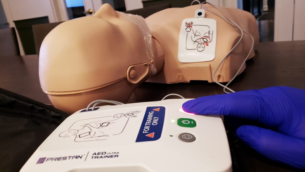 AED trainer device with manikin