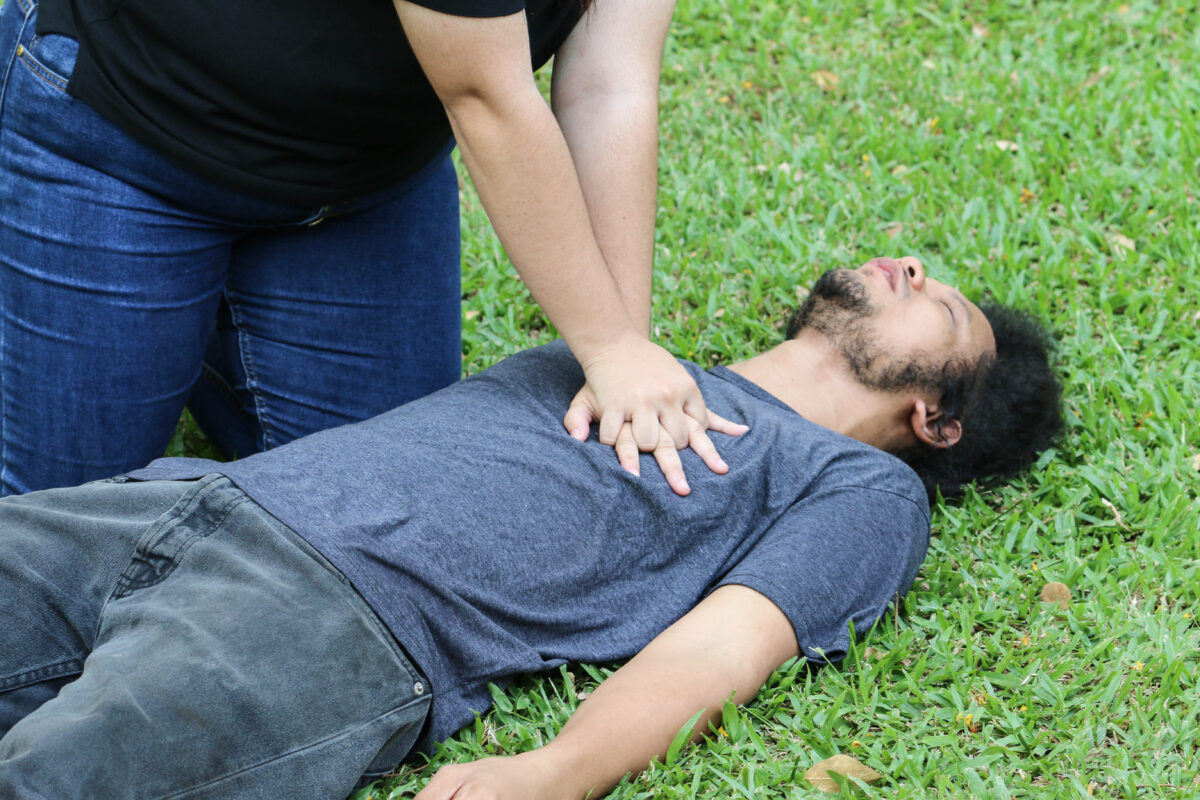 CPR demonstration in an outdoor setting